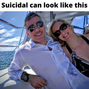 Shawn Wells smiling on a boat